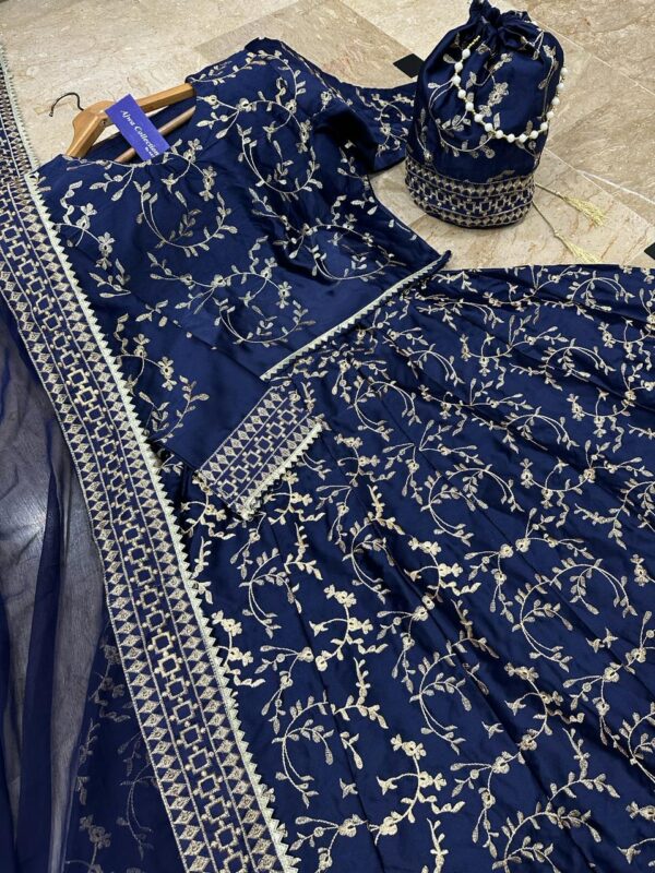 4 Piece Front Embroidered Top With Long Flare Embroidery Skirt And Four Side Border Embroidered Dupatta With Eidi Potli